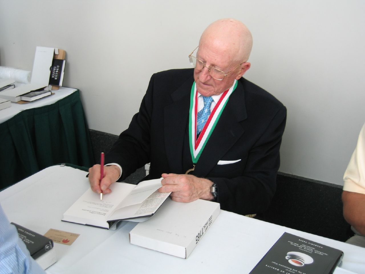 Dr. Illy signs a copy of my Espresso Chemistry of Quality Book