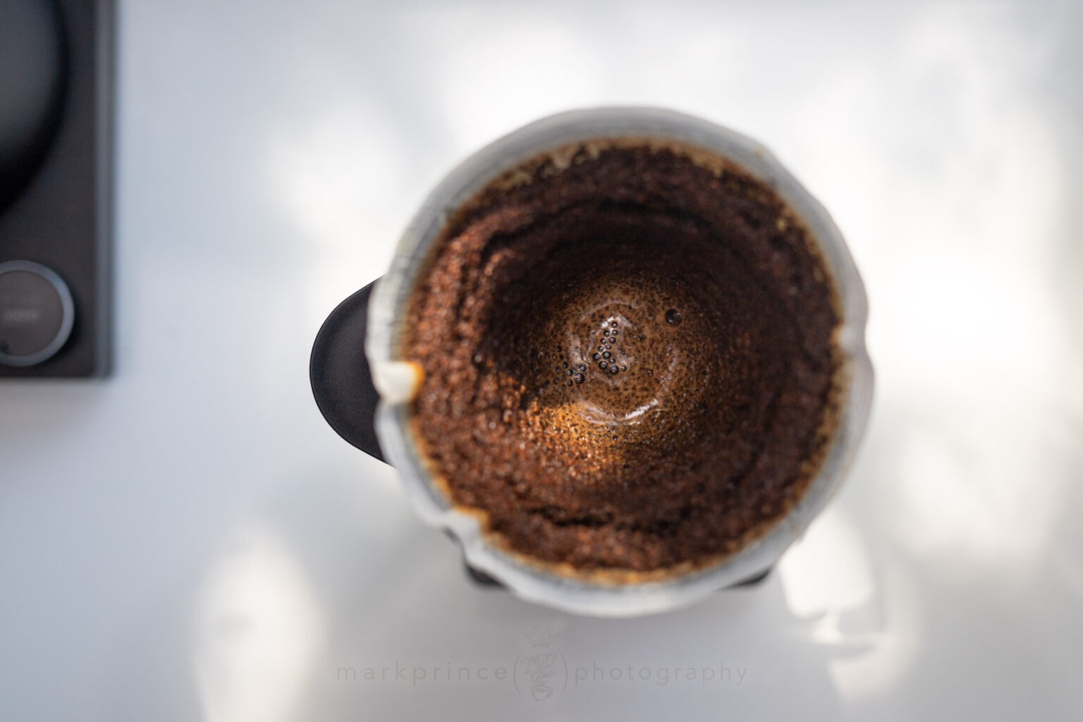 When the brew is done, you should see a cone shape of spent coffee inside the dripper.