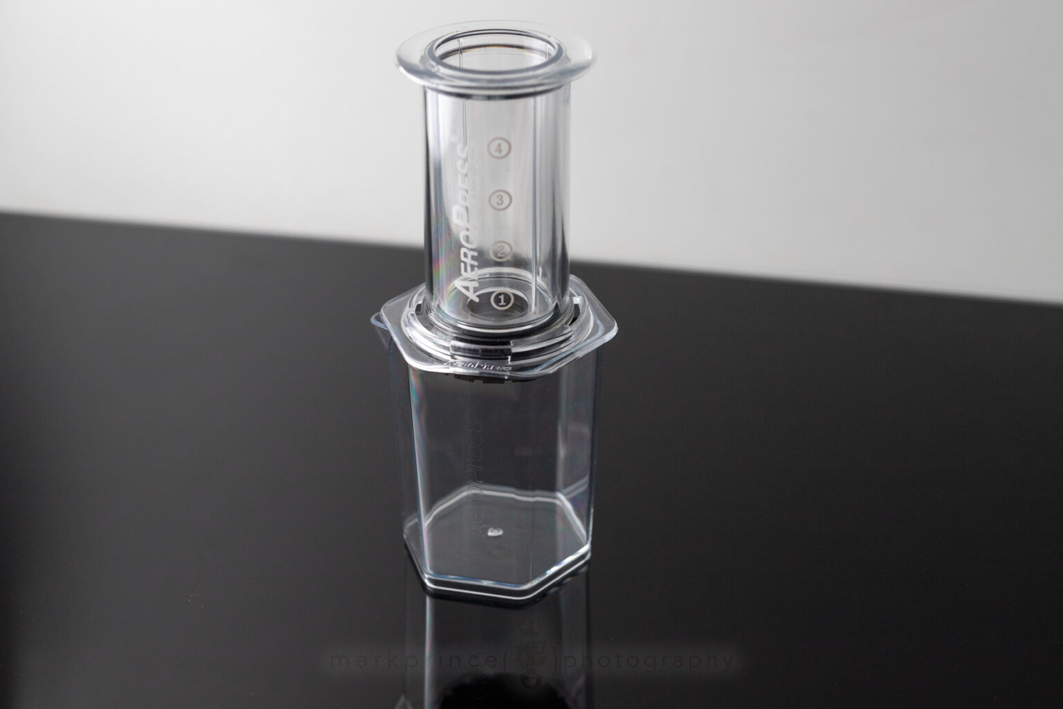 The Tritan plastic carafe that ships with the AeroPress XL works fine with standard AeroPress models