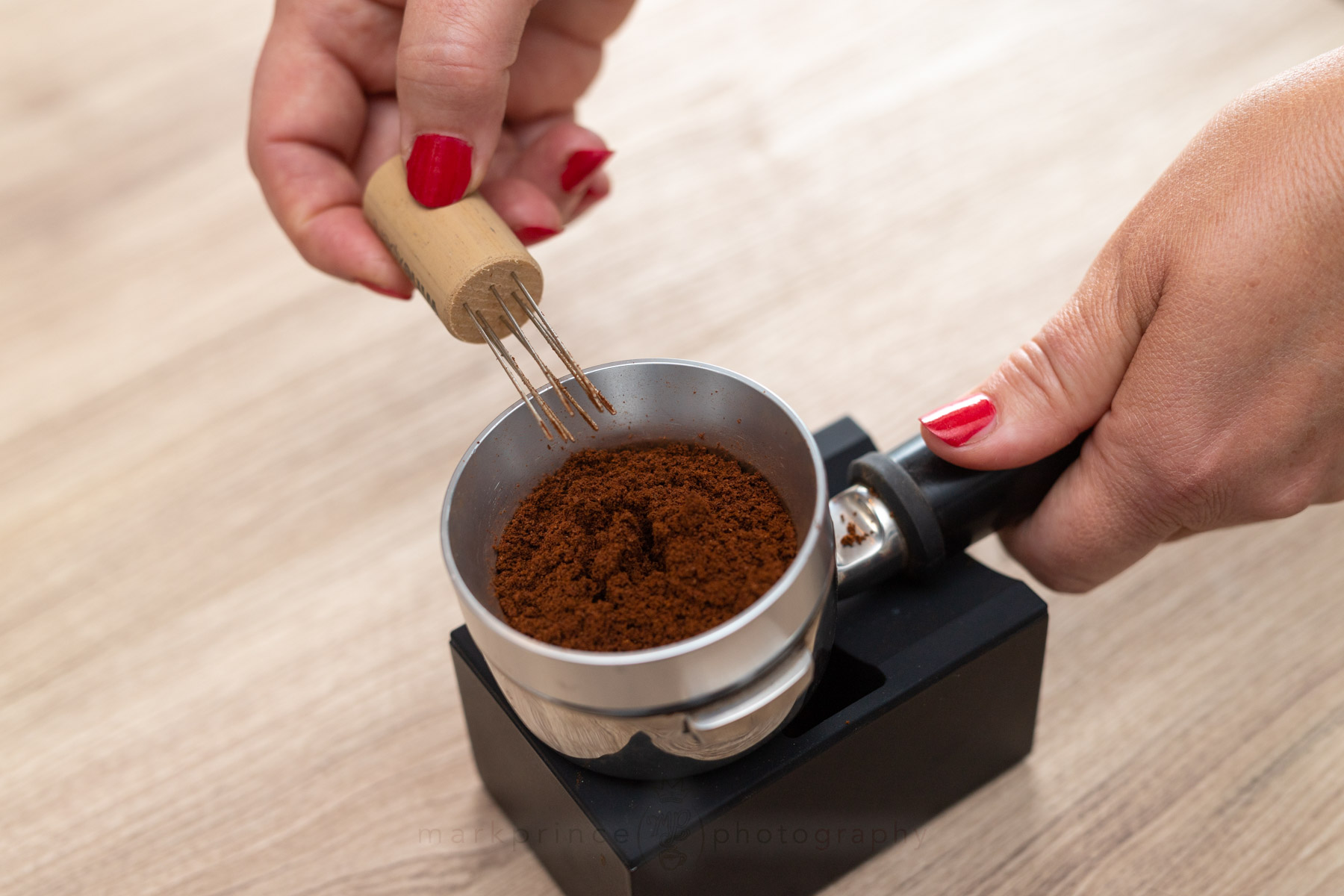 Using a cork to stir ground coffee