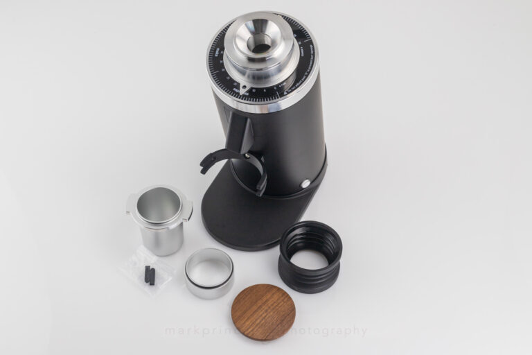Dosing Cup, dosing collar, nice wood cap, good quality silicone bellows, and a couple spare rubberized grips for the doser's mounting forks.