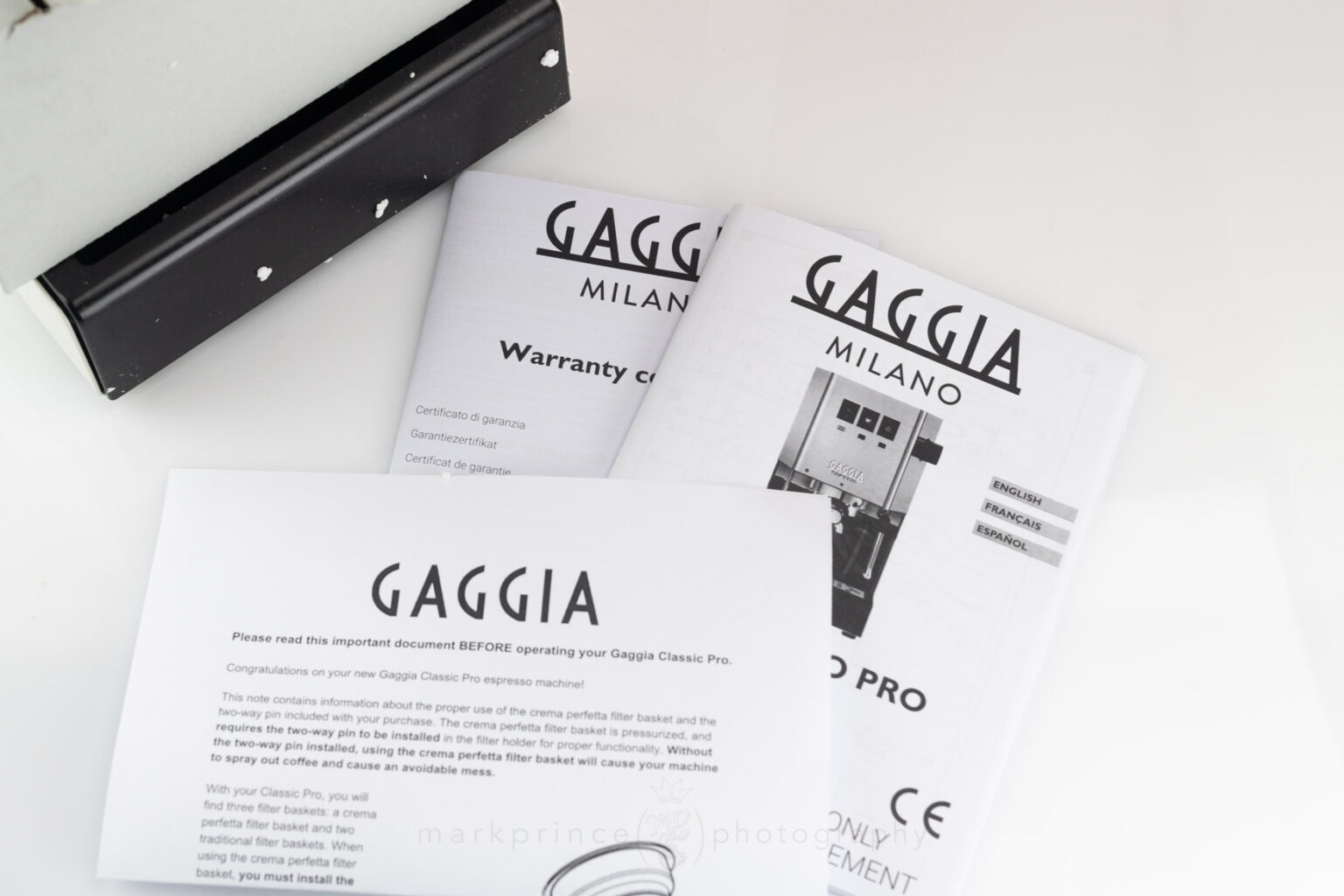 Gaggia manuals, warranty and a "read first" notice about the pressurized portafilter filter basket and plastic insert.