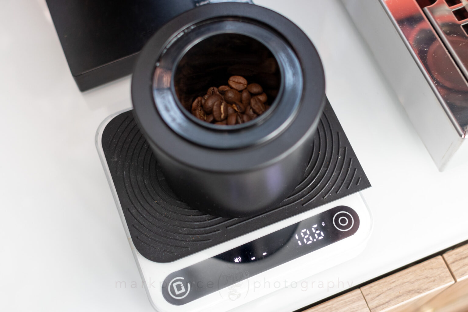 Measuring out 18.6g for espresso grinding on the Fellow Opus