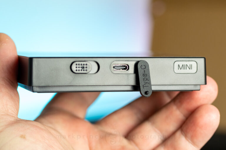 The charging port is easily accessible by opening the flap. The flap stays connected.