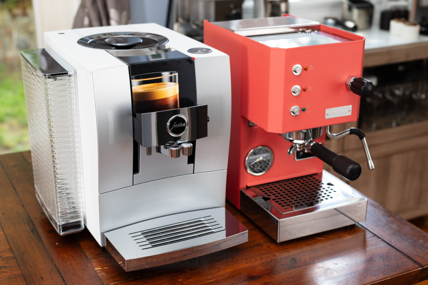 The Jura Z10 next to a Profitec Go. Both are similar sizes in width; the Z10 is deeper by about 10cm.