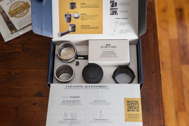 Inside you'll find the portafilter, Luxe basket, tamper, dosing collar, and the cleaning and maintenance kit.