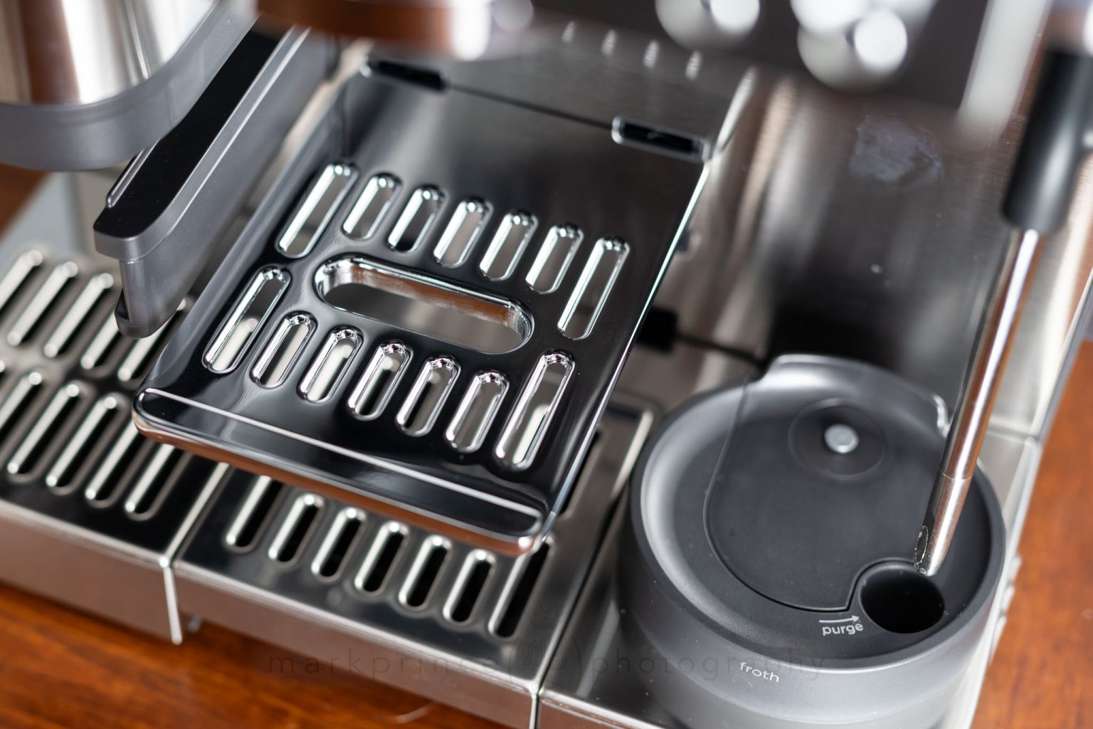 The removable, elevated second cup tray. It can also be slotted into place to be level with the bottom tray.