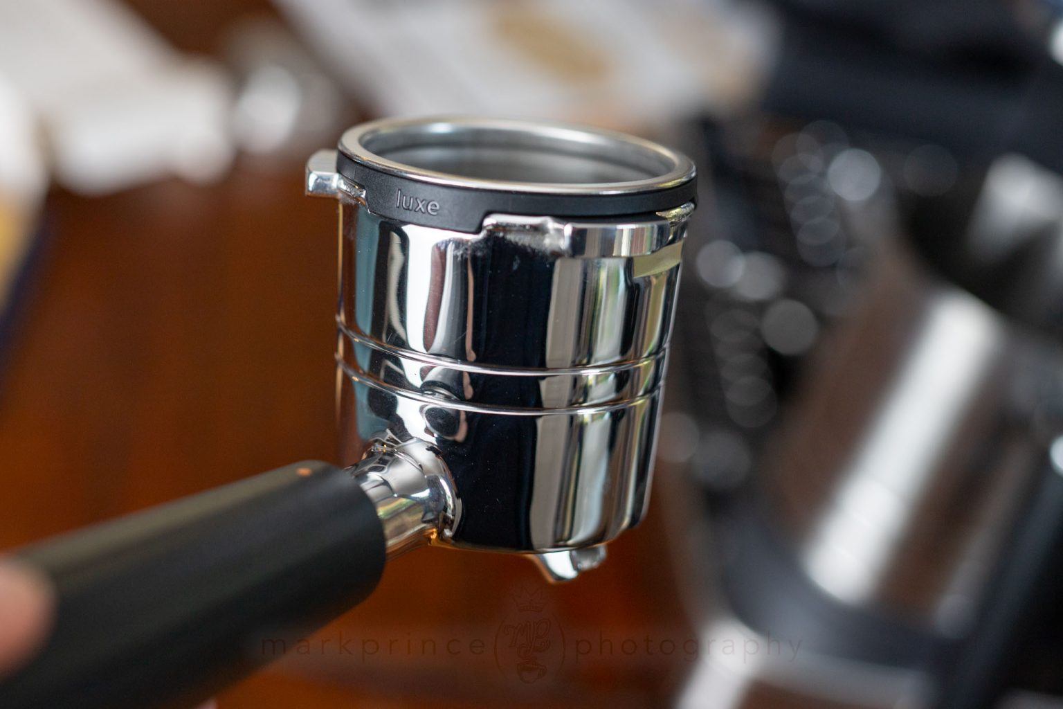 The double filter in place. Note the rubber collar on the filter basket that only fits one way in the portafilter. I suspect the machine "reads" this type, and knows which basket you are using.