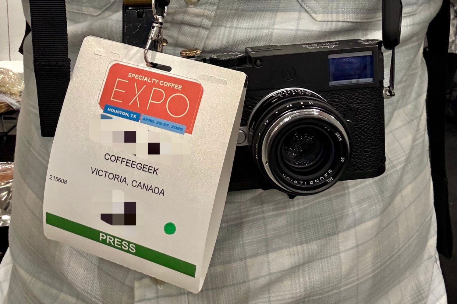 At the SCA Expo, Press Badge, Leica Camera, and notepad, ready to rock and roll.