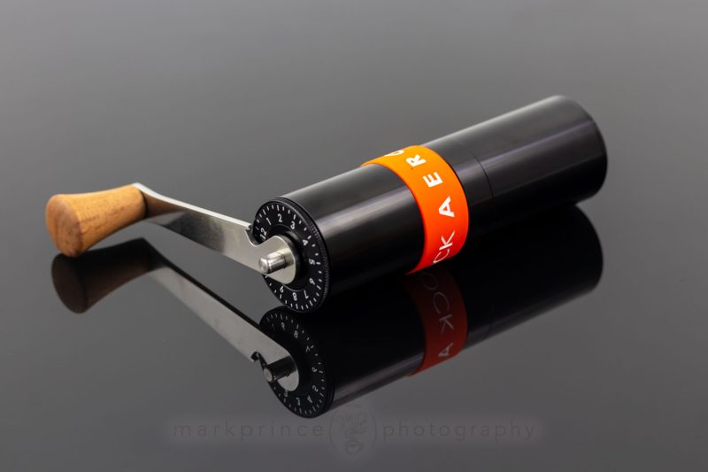 Aergrind coffee grinder, lying on its side.