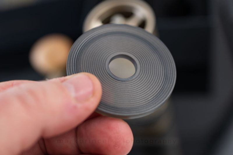 This is the secondary lid the grinder ships with, if you'd prefer to use a cordless drill to electrically churn the burrs.